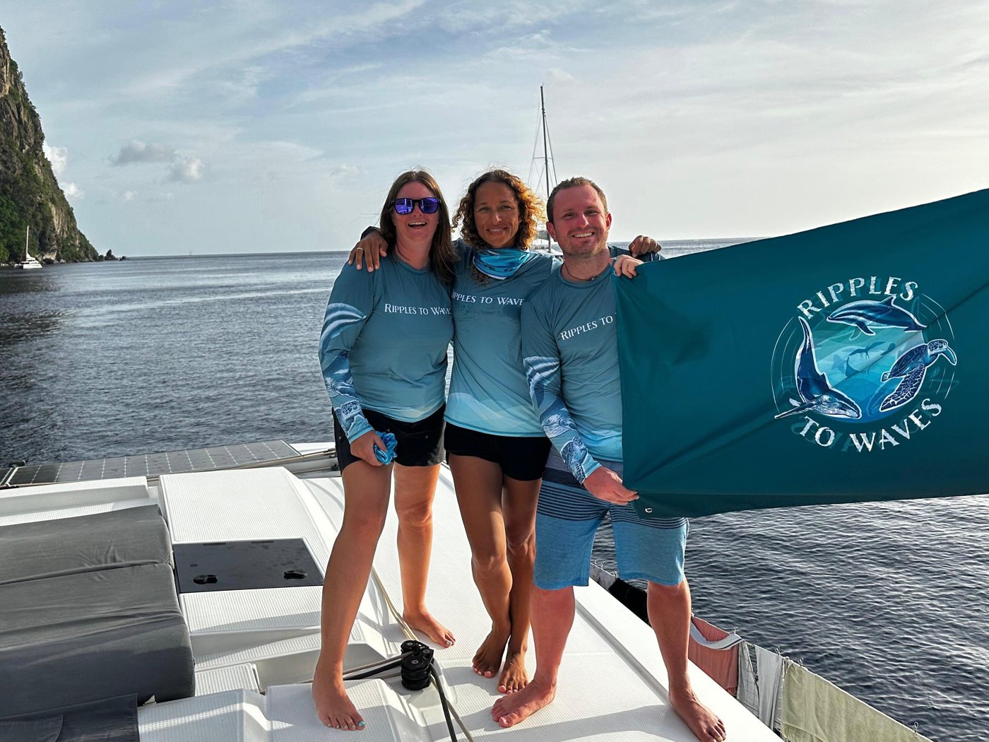 Ripples to Waves · The Grenadines team wearing custom rash guards by The Ocean Lung